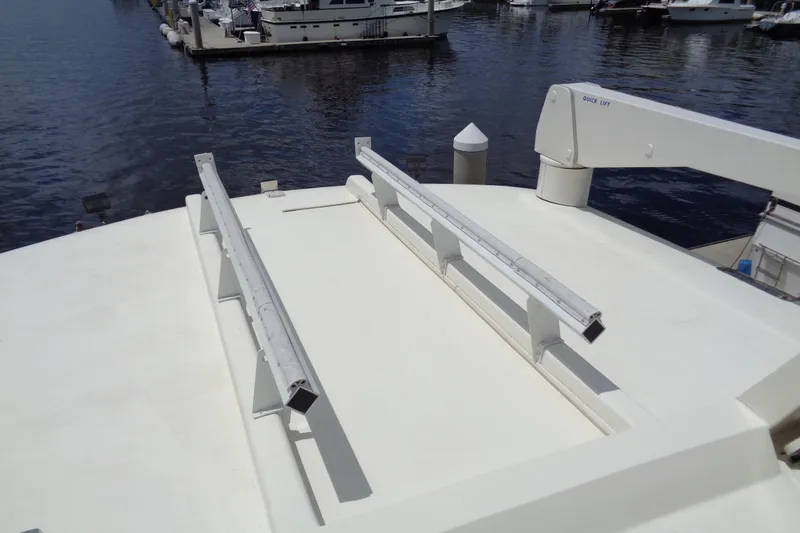 Ivory Lady Yacht Photos Pics 1987 Hatteras 70 Cockpit Motor Yacht deck with railing and water view.
