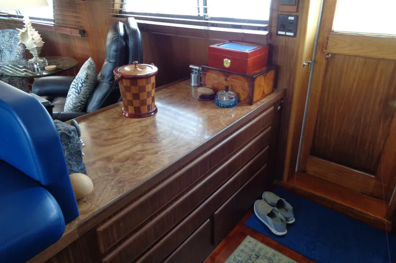 Ivory Lady Yacht Photos Pics Interior of 1987 Hatteras 70 Cockpit Motor Yacht with wooden cabinetry and decor.