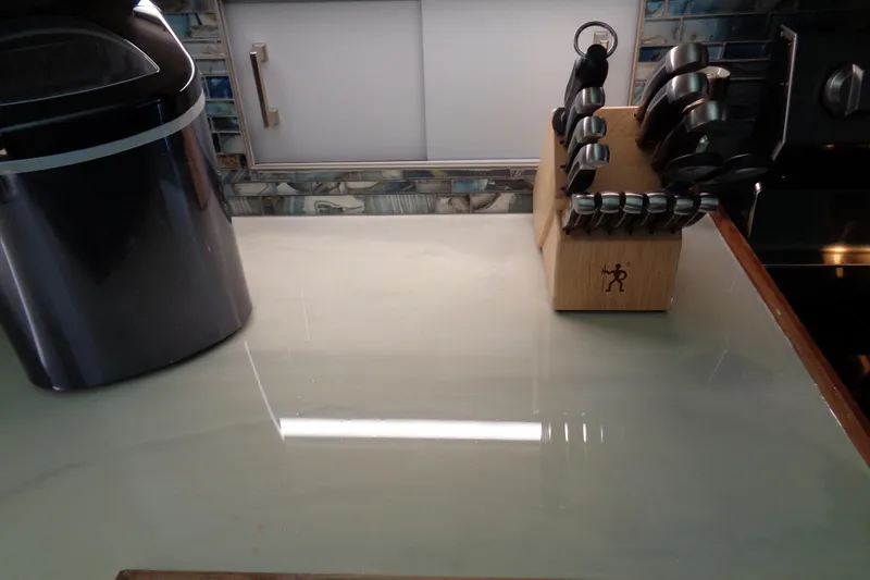 Ivory Lady Yacht Photos Pics Kitchen countertop with knife block and appliance, Hatteras 70 Cockpit Motor Yacht, 1987.