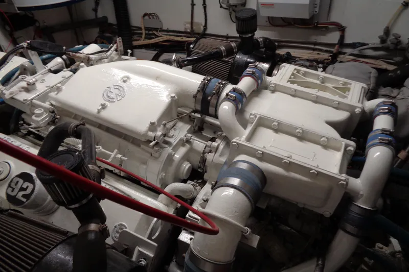 Ivory Lady Yacht Photos Pics Engine room of 1987 Hatteras 70 Cockpit Motor Yacht with visible machinery and components.