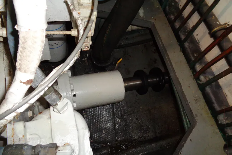 Ivory Lady Yacht Photos Pics Engine room of 1987 Hatteras 70 Cockpit Motor Yacht, showing mechanical components.