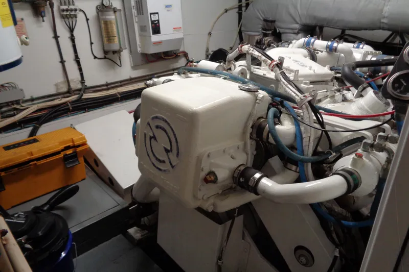 Ivory Lady Yacht Photos Pics Engine room of 1987 Hatteras 70 Cockpit Motor Yacht with visible machinery and wiring.