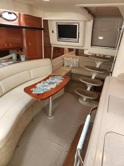  Yacht Photos Pics Luxurious interior of 2005 Sea Ray 340 Sundancer yacht with elegant seating and modern amenities.