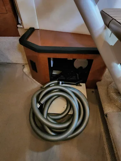  Yacht Photos Pics Coiled hose inside a 2005 Sea Ray 340 Sundancer boat interior.