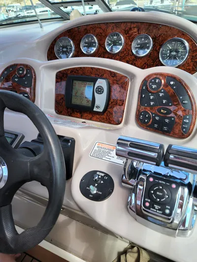  Yacht Photos Pics Dashboard of a 2005 Sea Ray 340 Sundancer boat with gauges and controls.