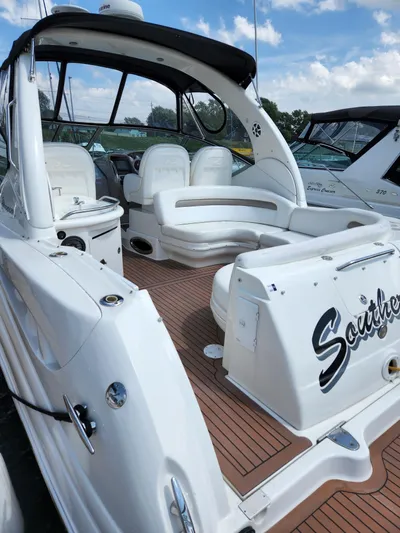  Yacht Photos Pics 2005 Sea Ray 340 Sundancer yacht with spacious seating and sleek design.