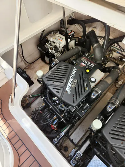  Yacht Photos Pics Engine compartment of a 2005 Sea Ray 340 Sundancer with Mercury engine components.