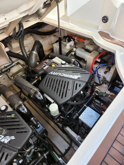  Yacht Photos Pics Engine compartment of a 2005 Sea Ray 340 Sundancer with Mercury engines.