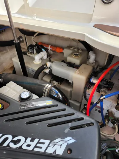  Yacht Photos Pics Engine compartment of 2005 Sea Ray 340 Sundancer with MerCruiser components and plumbing.
