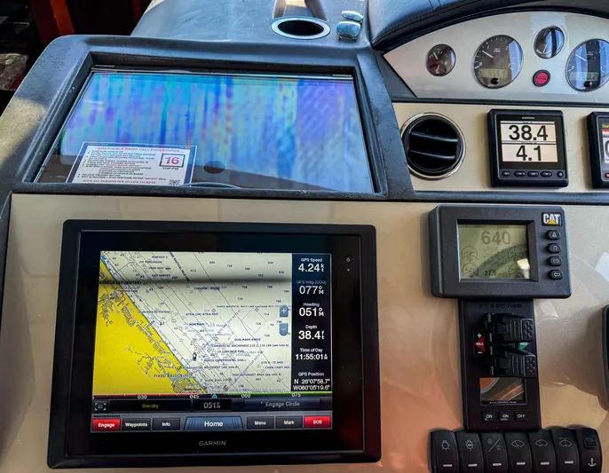 Bottoms Up Yacht Photos Pics Control panel of 2015 Princess V52 yacht with navigation and monitoring systems.