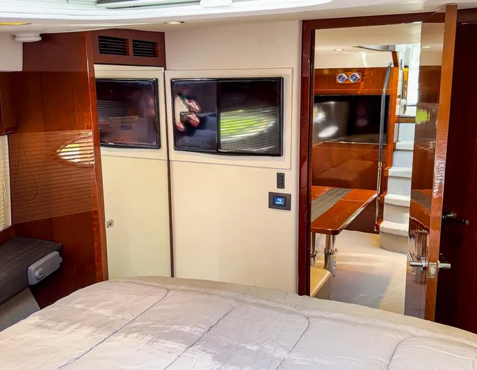 Bottoms Up Yacht Photos Pics Luxurious interior of 2015 Princess V52 yacht with modern furnishings and elegant design.