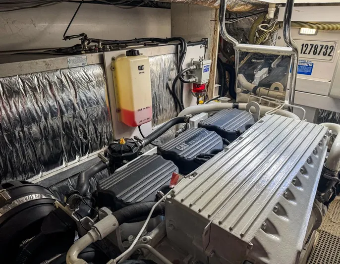 Bottoms Up Yacht Photos Pics Engine room of 2015 Princess V52 yacht, showcasing detailed machinery and components.