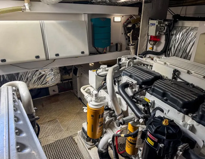Bottoms Up Yacht Photos Pics Engine room of 2015 Princess V52 yacht, showcasing mechanical components and systems.