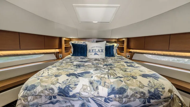  Yacht Photos Pics Luxurious bedroom interior of 2015 Sea Ray 510 Fly yacht with floral bedding.