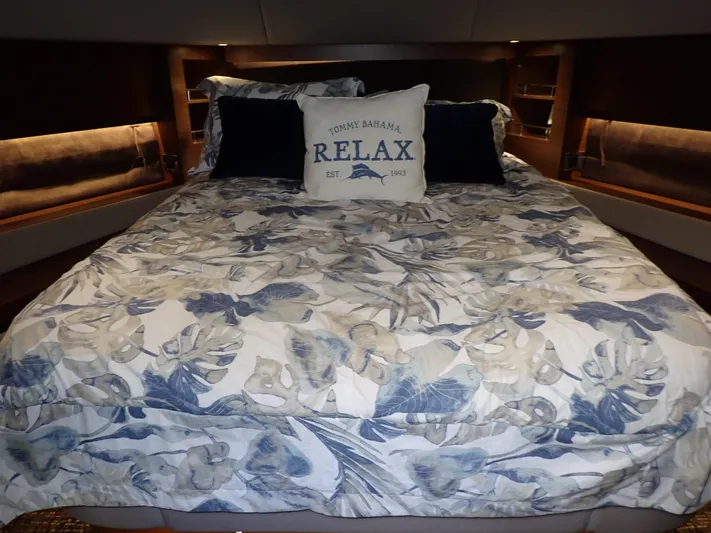  Yacht Photos Pics Luxurious bedroom in 2015 Sea Ray 510 Fly yacht with floral bedding and "Relax" pillow.