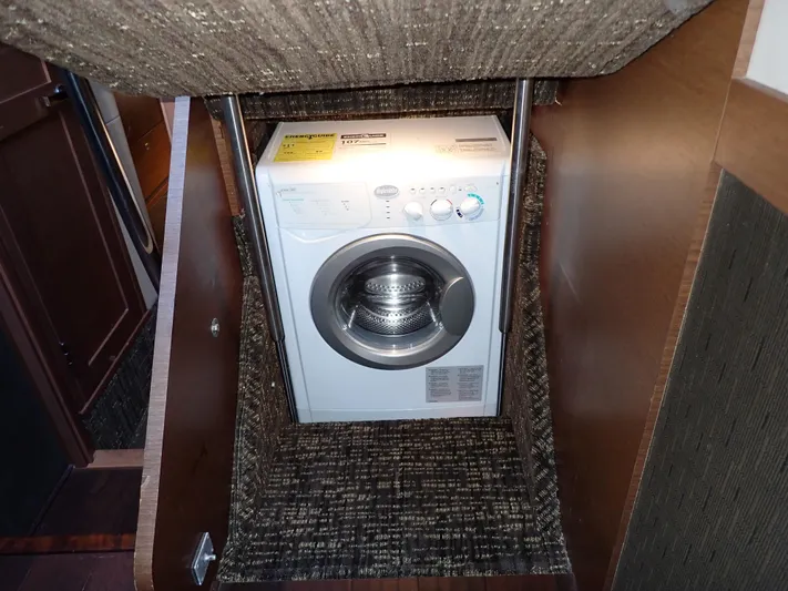  Yacht Photos Pics Washing machine in 2015 Sea Ray 510 Fly yacht interior, under stair storage.