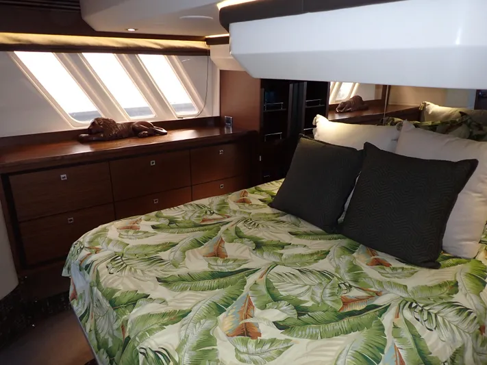  Yacht Photos Pics Luxurious cabin interior of 2015 Sea Ray 510 Fly yacht with tropical bedding.