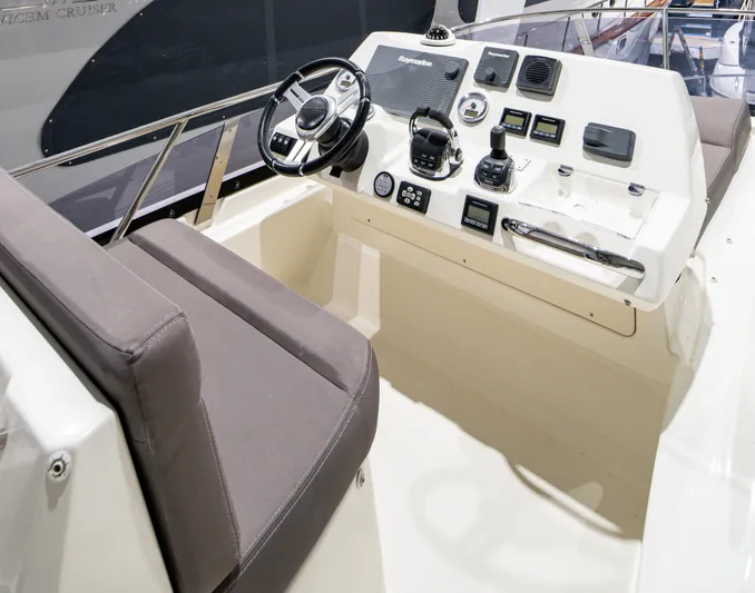 Margie Yacht Photos Pics 2018 Prestige 460 yacht helm with modern controls and comfortable seating.