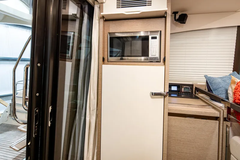 Margie Yacht Photos Pics Interior of 2018 Prestige 460 yacht with modern kitchen amenities.