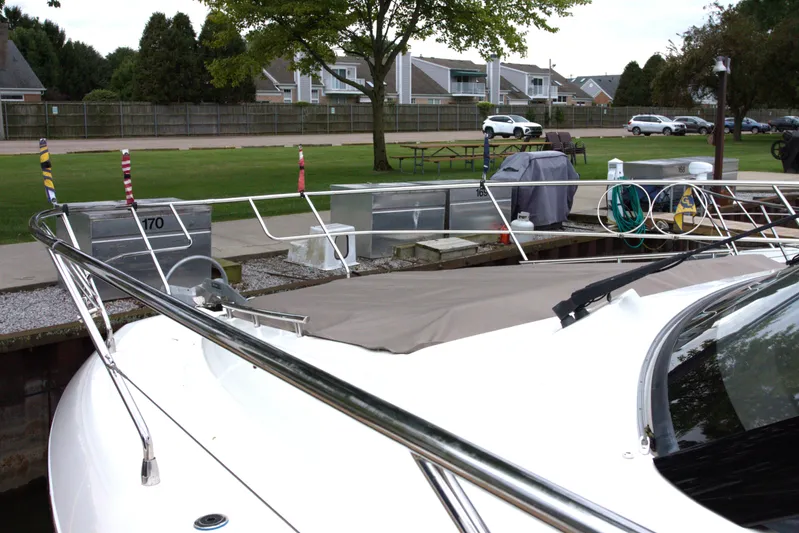 Margie Yacht Photos Pics 2018 Prestige 460 yacht docked at marina with residential background.