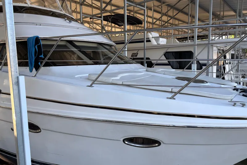  Yacht Photos Pics 2001 Carver 396 Motor Yacht in storage, featuring sleek design and polished exterior.