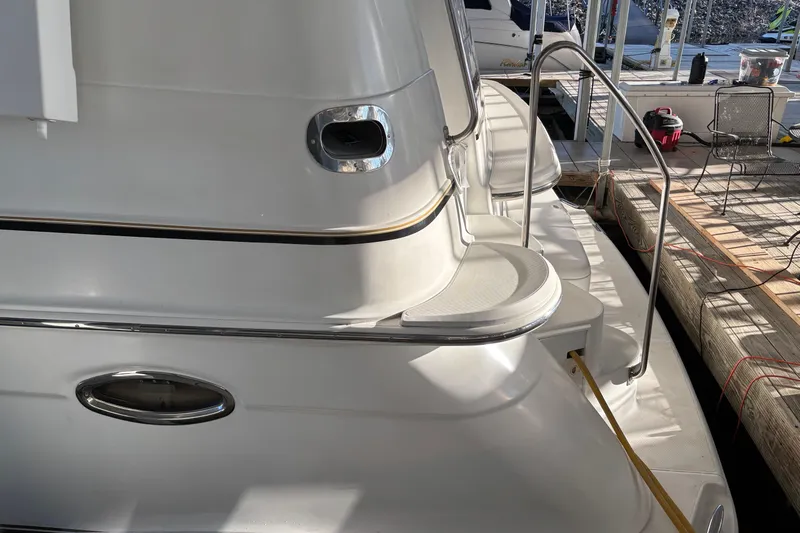  Yacht Photos Pics 2001 Carver 396 Motor Yacht docked, showcasing sleek design and elegant curves.