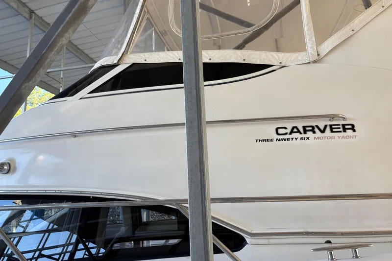  Yacht Photos Pics 2001 Carver 396 Motor Yacht in dock, showcasing sleek white exterior design.