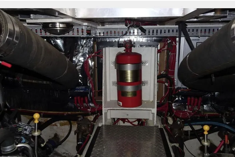  Yacht Photos Pics Engine room of 2001 Carver 396 Motor Yacht with fire extinguisher and wiring.