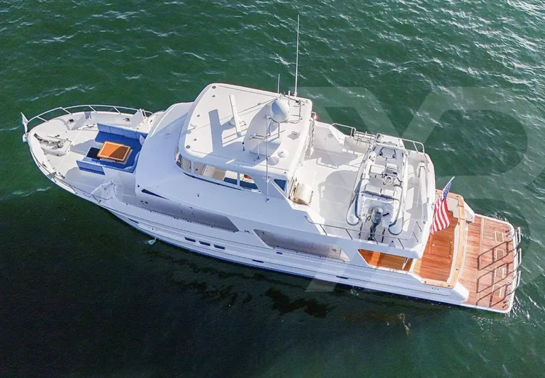 Daddo O Yacht Photos Pics 2023 Outer Reef Yachts 720 Azure Custom Cockpit Motoryacht on open water, aerial view.