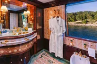 Luxurious Benetti Custom 2008 yacht bathroom with elegant decor and scenic ocean view.