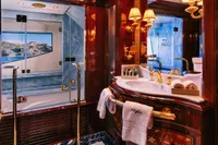 Luxurious bathroom on 2008 Benetti Custom yacht with elegant fixtures and marble accents.