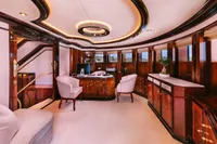 Luxurious interior of a 2008 Benetti Custom yacht with elegant wood paneling and modern furnishings.