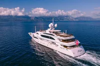 Luxurious 2008 Benetti Custom yacht cruising on serene blue waters.