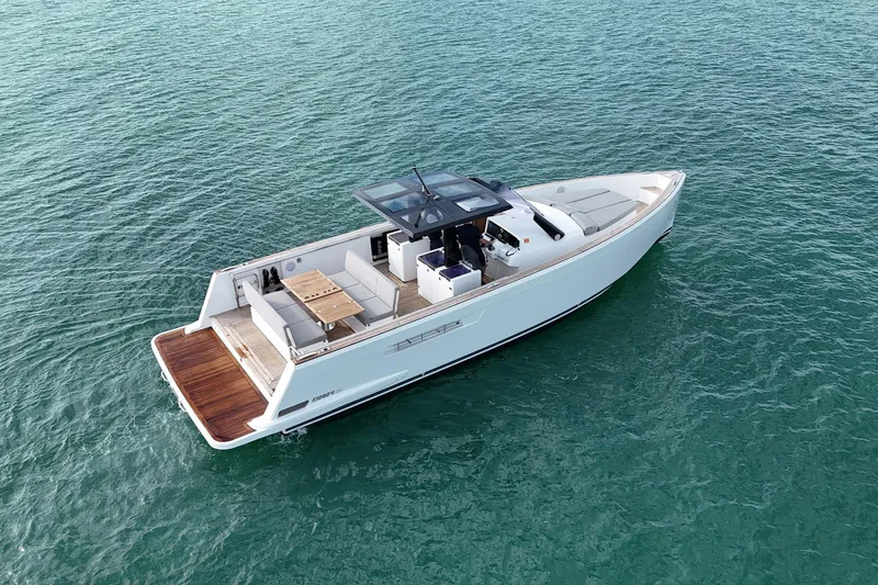  Yacht Photos Pics 2013 Fjord 40' Open yacht cruising on clear blue water.