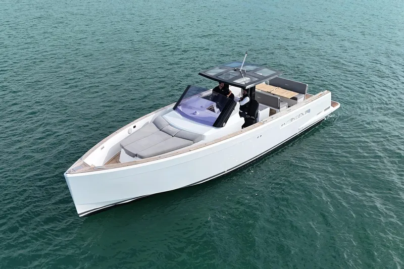  Yacht Photos Pics 2013 Fjord 40' Open yacht cruising on calm waters.