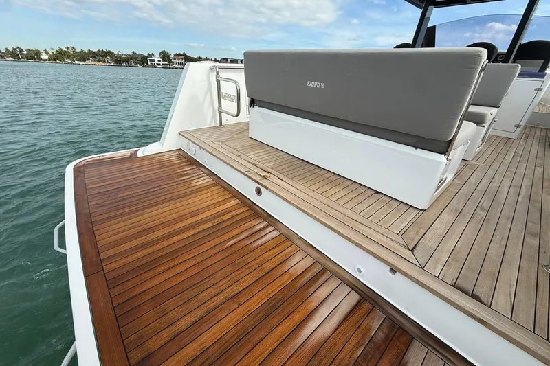  Yacht Photos Pics Luxury 2013 Fjord 40' Open yacht with elegant teak deck and comfortable seating.