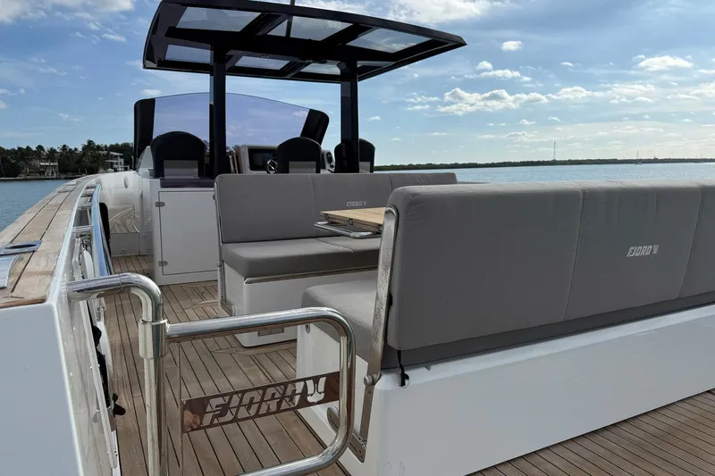  Yacht Photos Pics 2013 Fjord 40' Open yacht with sleek seating and modern design on a sunny day.