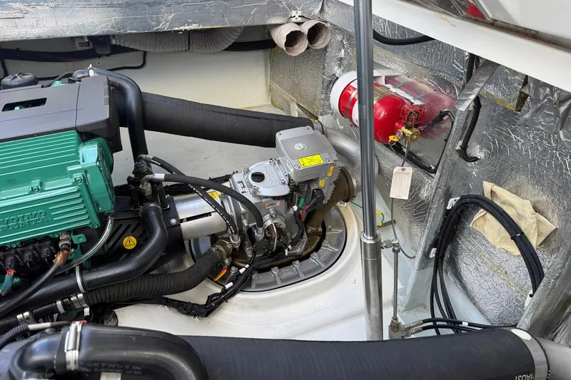  Yacht Photos Pics Engine compartment of a 2013 Fjord 40' Open boat, featuring Volvo Penta components.