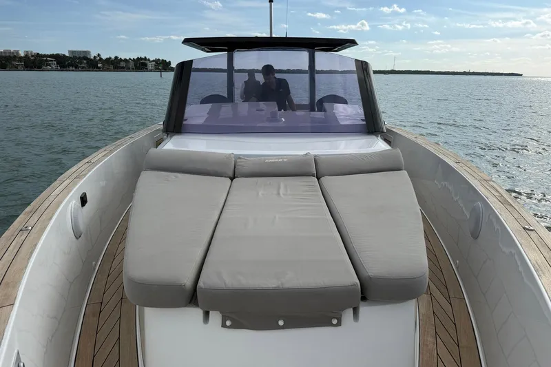  Yacht Photos Pics 2013 Fjord 40' Open yacht with sunbed, cruising on calm waters.