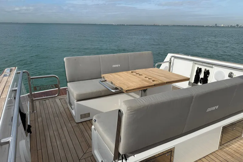  Yacht Photos Pics Luxurious 2013 Fjord 40' Open yacht with spacious deck seating and ocean view.