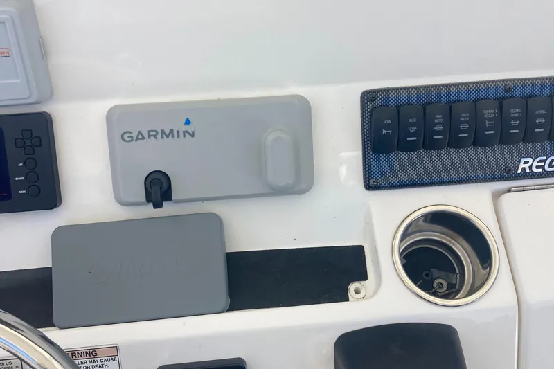  Yacht Photos Pics Control panel of 2018 Regulator 28 Center Console with Garmin and Yamaha covers.