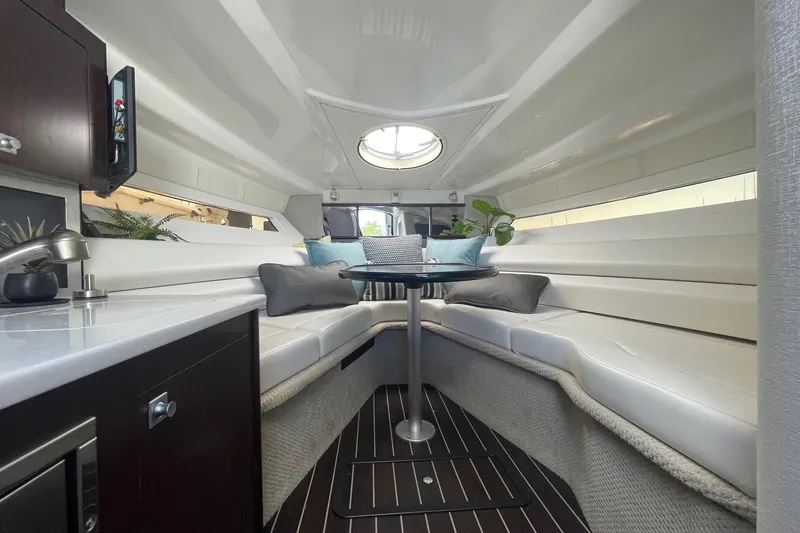  Yacht Photos Pics Luxurious interior of 2018 Monterey 295 Sport Yacht with sleek seating and modern decor.