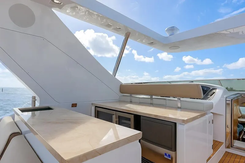 Amanecer Yacht Photos Pics Luxurious 2009 Azimut 105 yacht deck with sleek design and ocean view.