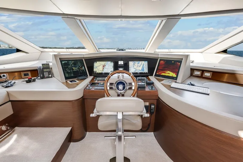 Amanecer Yacht Photos Pics Luxurious 2009 Azimut 105 yacht helm with advanced navigation systems and panoramic ocean view.