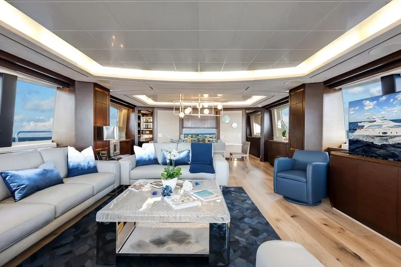 Amanecer Yacht Photos Pics Luxurious interior of 2009 Azimut 105 yacht with elegant seating and modern decor.