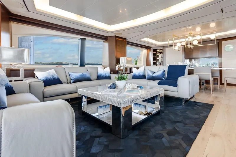 Amanecer Yacht Photos Pics Luxurious interior of 2009 Azimut 105 yacht with elegant seating and modern decor.