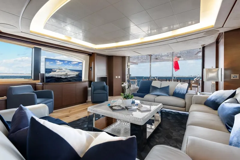 Amanecer Yacht Photos Pics Luxurious interior of 2009 Azimut 105 yacht with elegant seating and ocean view.