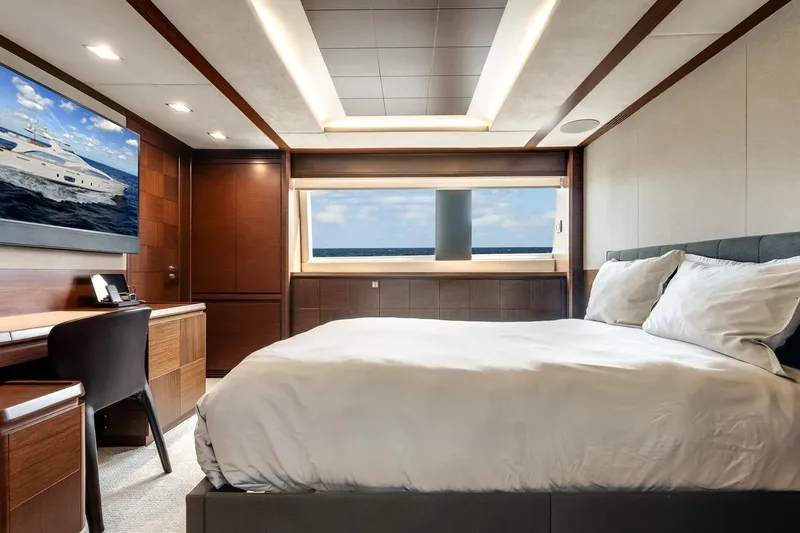 Amanecer Yacht Photos Pics Luxurious bedroom interior of 2009 Azimut 105 yacht with ocean view and modern decor.