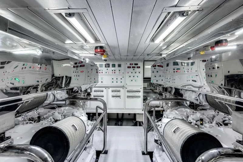 Amanecer Yacht Photos Pics Engine room of 2009 Azimut 105 yacht, featuring advanced control panels and machinery.