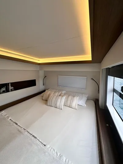Hayat Yacht Photos Pics Luxurious bedroom interior of 2021 Nautitech 46 Fly yacht with modern lighting.